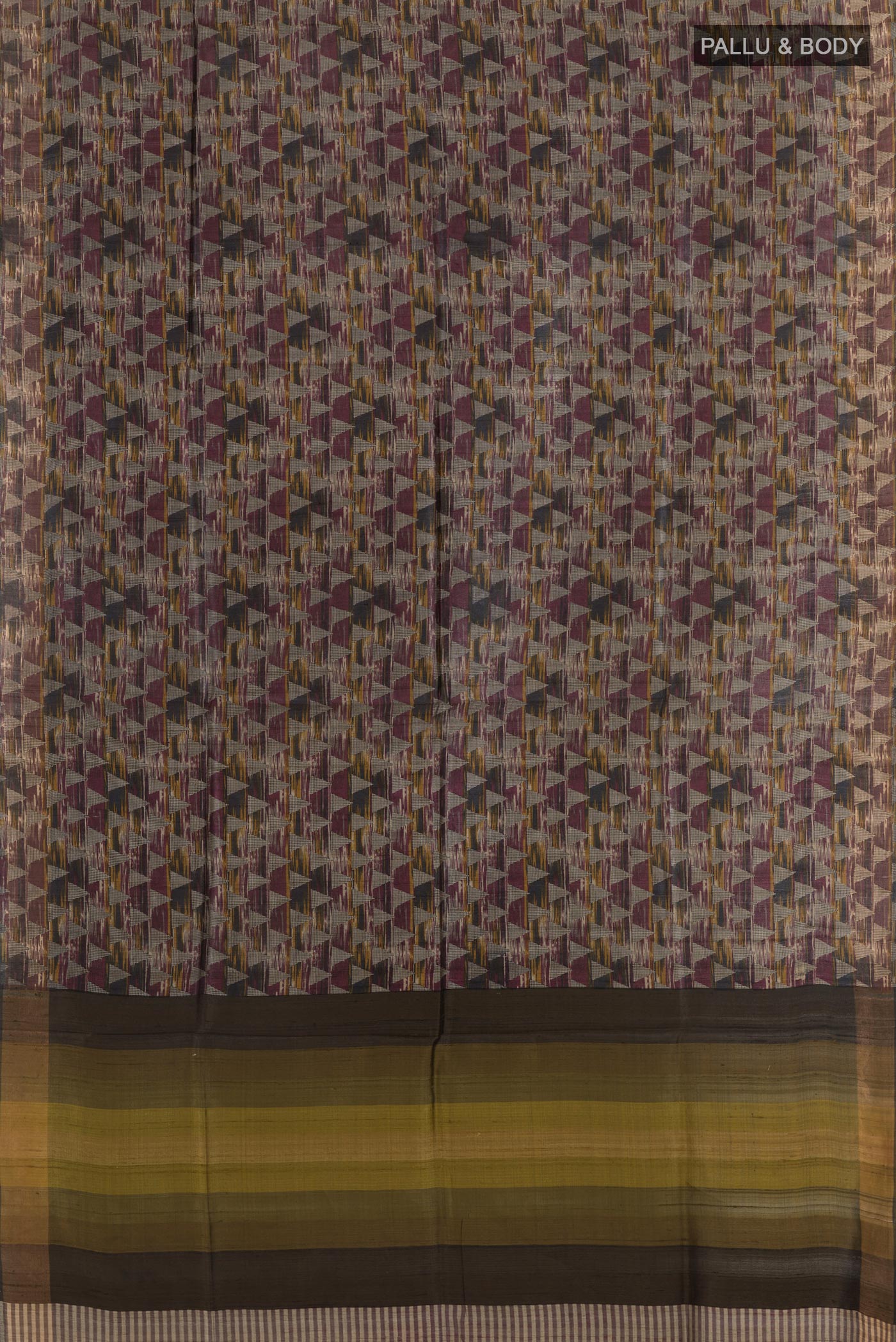 Flat view of Multi Color Tussar Saree with Printed design on the body and Zari Border. 