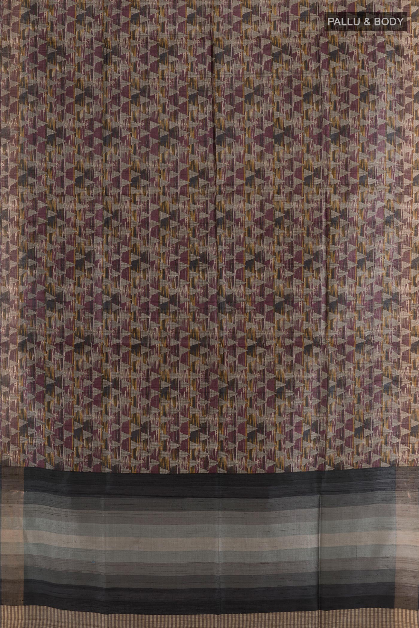 Flat view of Multi Color Tussar Saree with Printed design on the body and Zari Border. 
