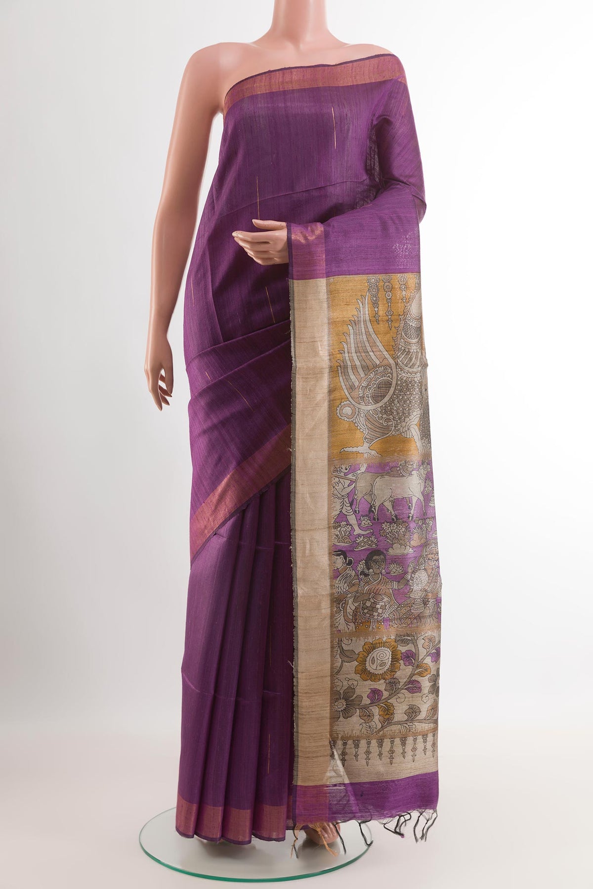 Purple Tussar Saree with Zari Butta on the body and Zari Border.  displayed on a mannequin