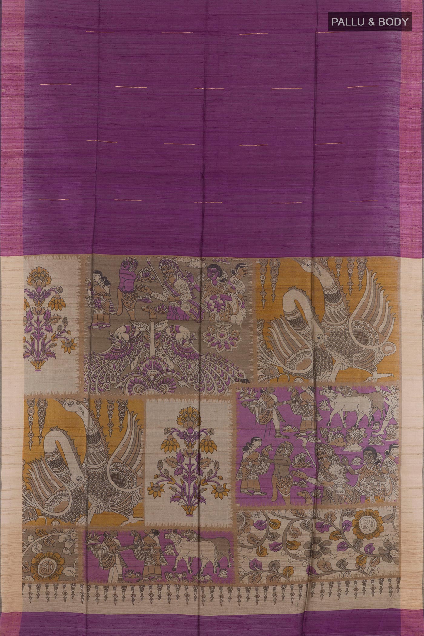 Flat view of Purple Tussar Saree with Zari Butta on the body and Zari Border. 