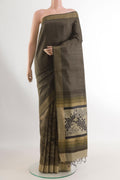 Green Tussar Silk Saree with Stripes on the body and Printed Border.  displayed on a mannequin
