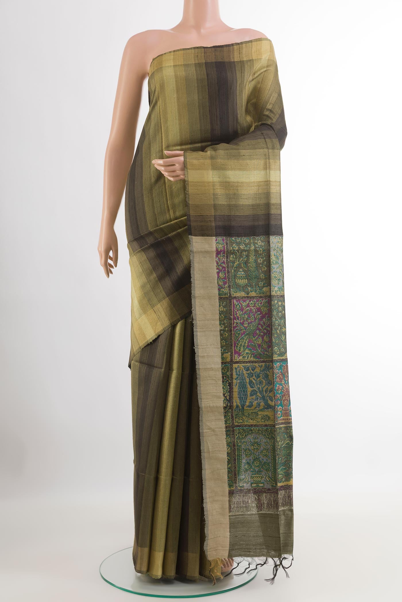 Mehandi Green Tussar Saree with Printed design on the body and Without Border.  displayed on a mannequin