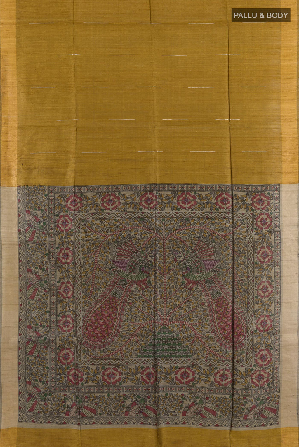 Flat view of Mustard Tussar Saree with Printed design on the body and Zari Border. 