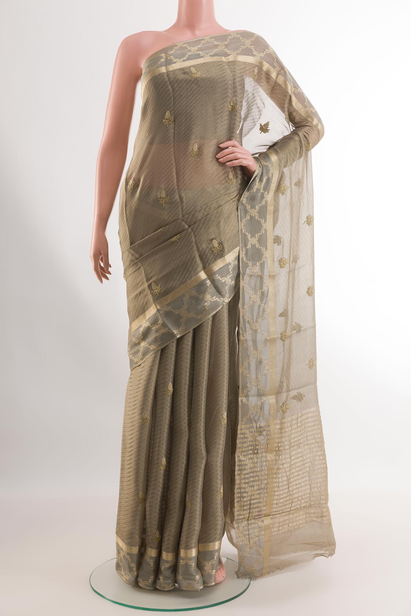 Mehandi Green Mysore Georgette Saree with Embroidery on the body and Printed Border.  displayed on a mannequin