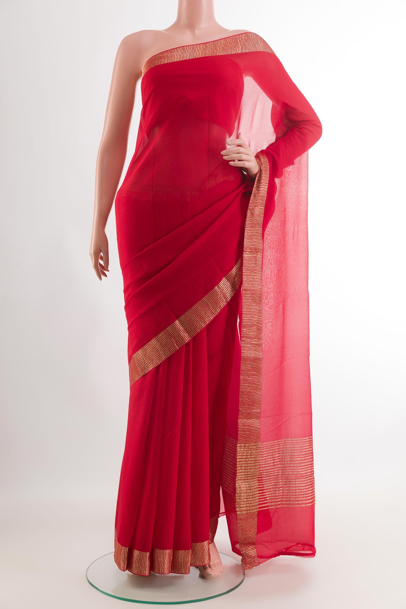 Red Mysore Chiffon Saree with Zari Butta on the body and Zari Border.  displayed on a mannequin