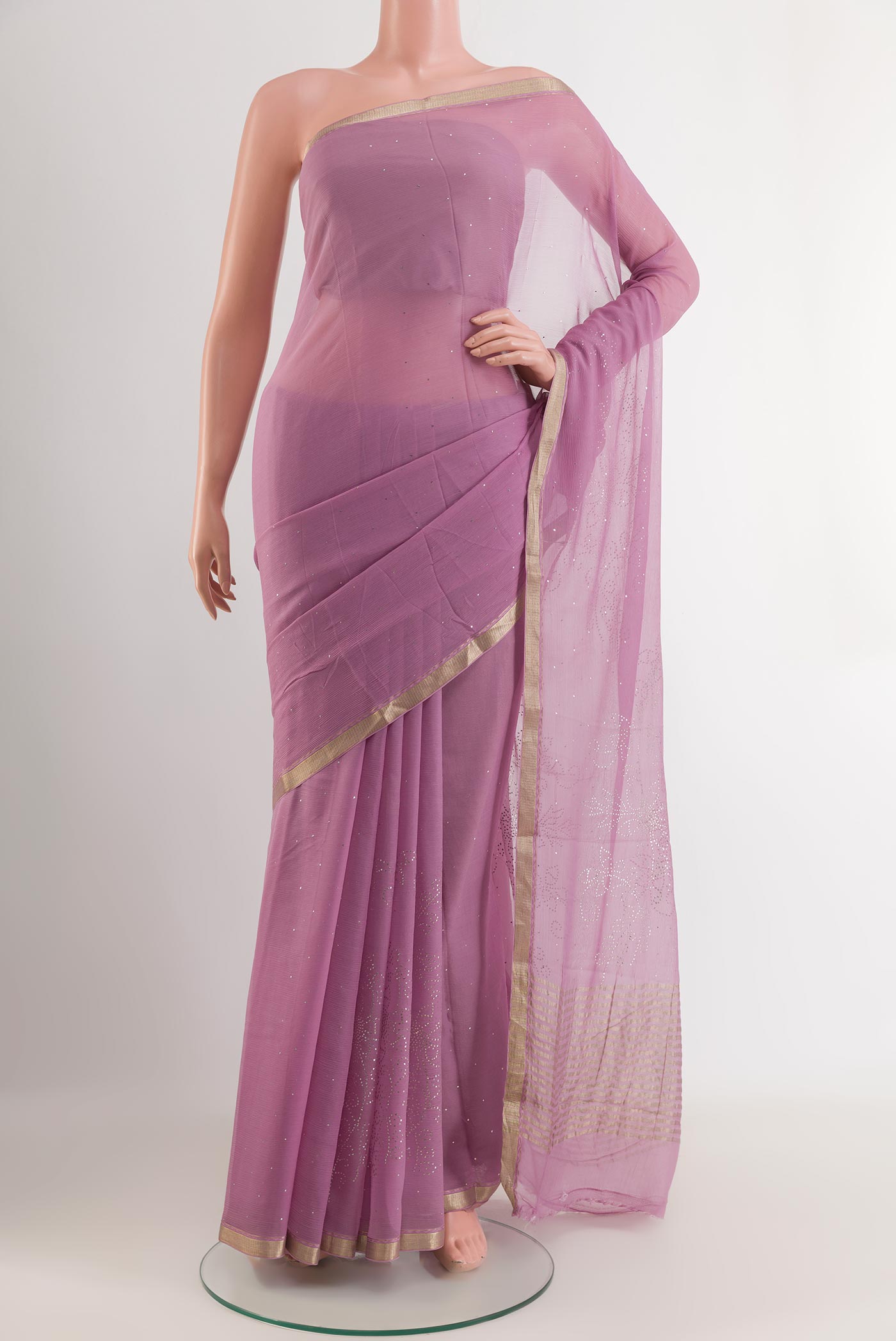 Lavender Mysore Chiffon Saree with Zari Butta on the body and Zari Border.  displayed on a mannequin