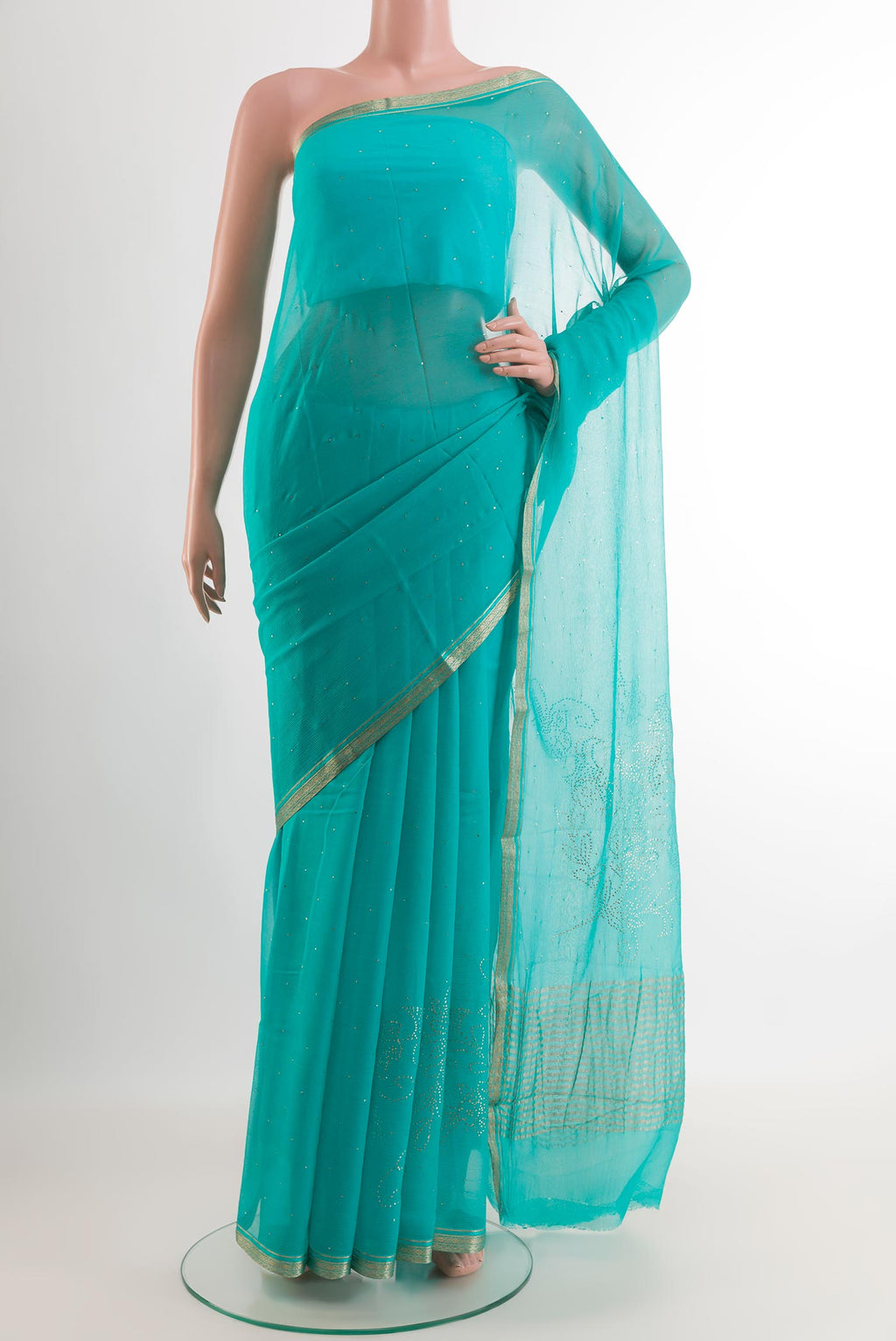 Blue Mysore Chiffon Saree with Plain Body and Zari Border.  displayed on a mannequin
