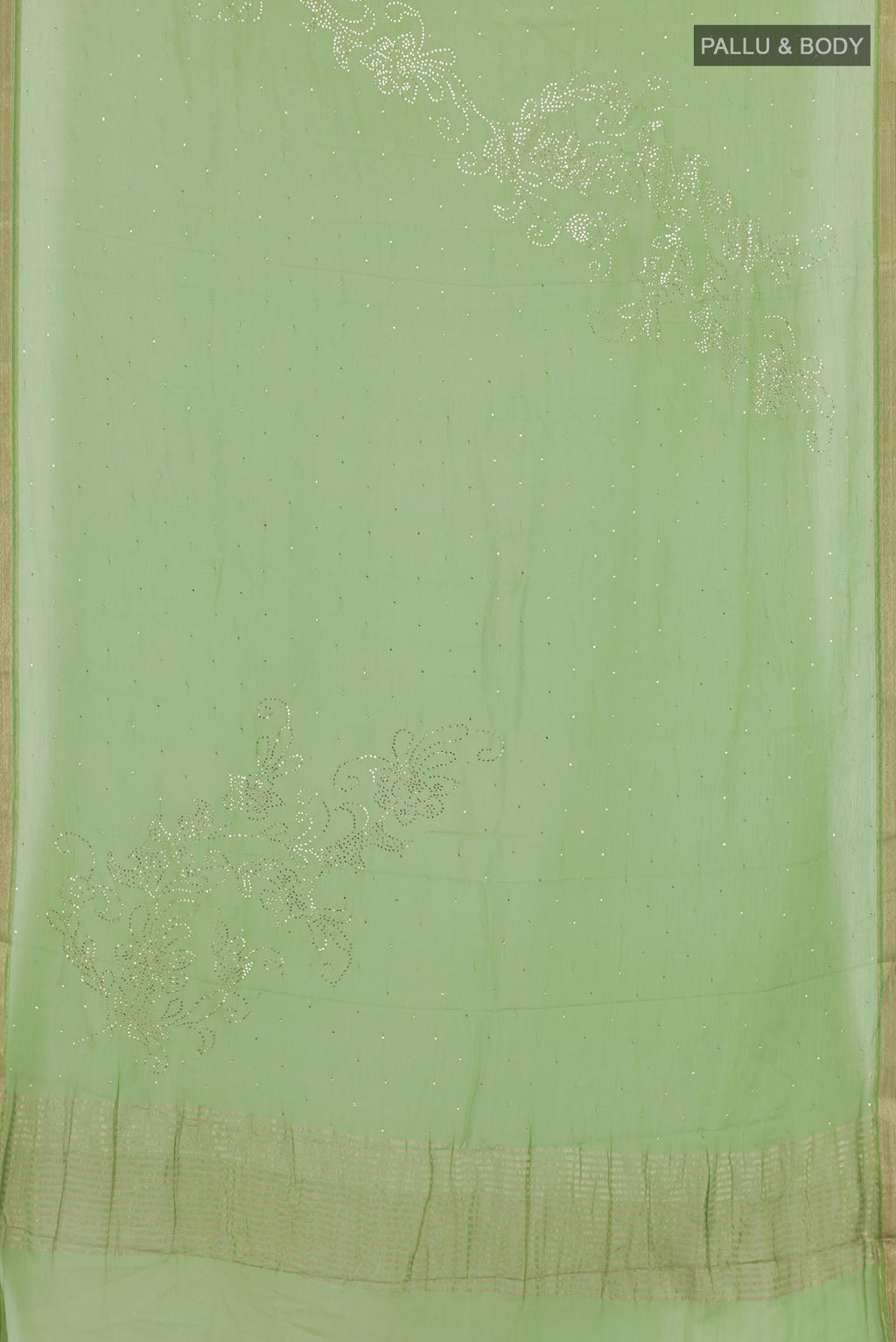 Flat view of Green Mysore Chiffon Saree with Zari Butta on the body and Zari Border. 