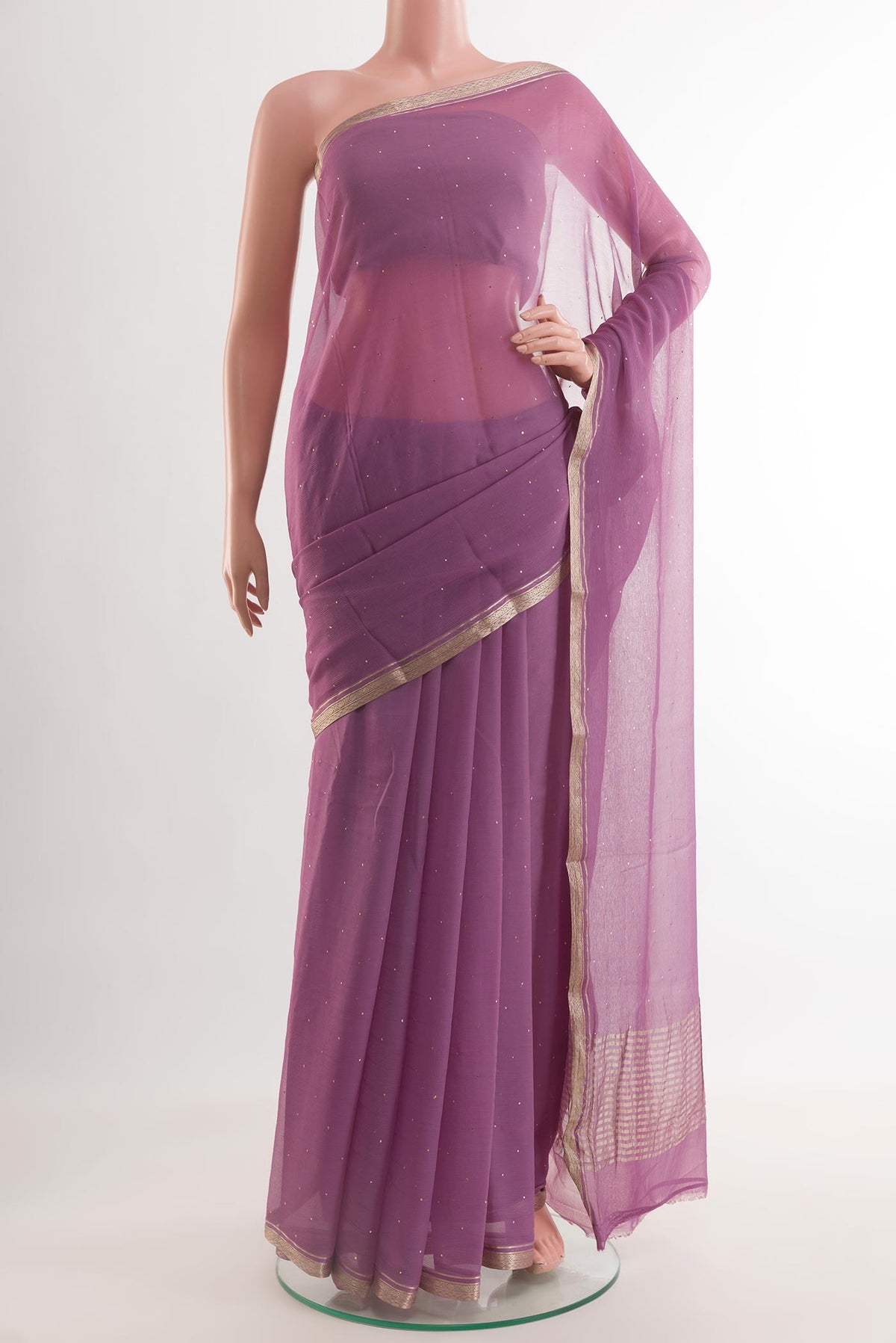 Lavender Mysore Chiffon Saree with Embroidery on the body and Zari Border.  displayed on a mannequin
