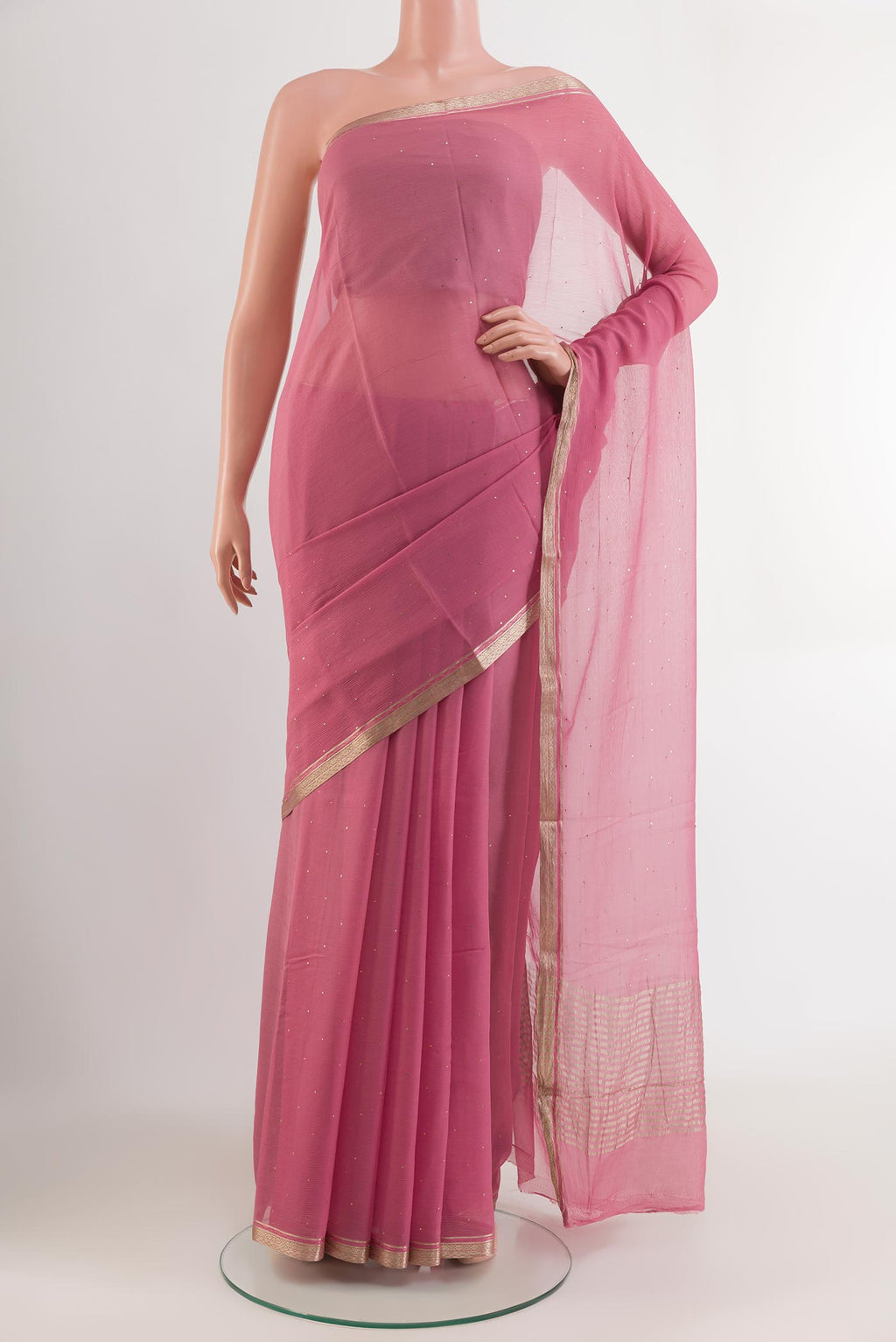 Pink Mysore Chiffon Saree with Zari Butta on the body and Zari Border.  displayed on a mannequin