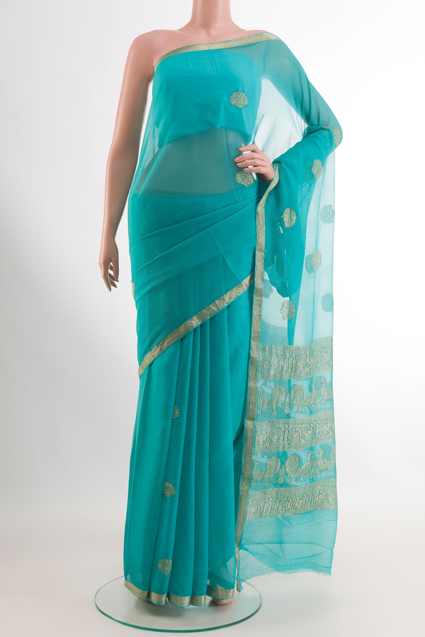 Blue Mysore Chiffon Saree with Zari Butta on the body and Plain Border.  displayed on a mannequin