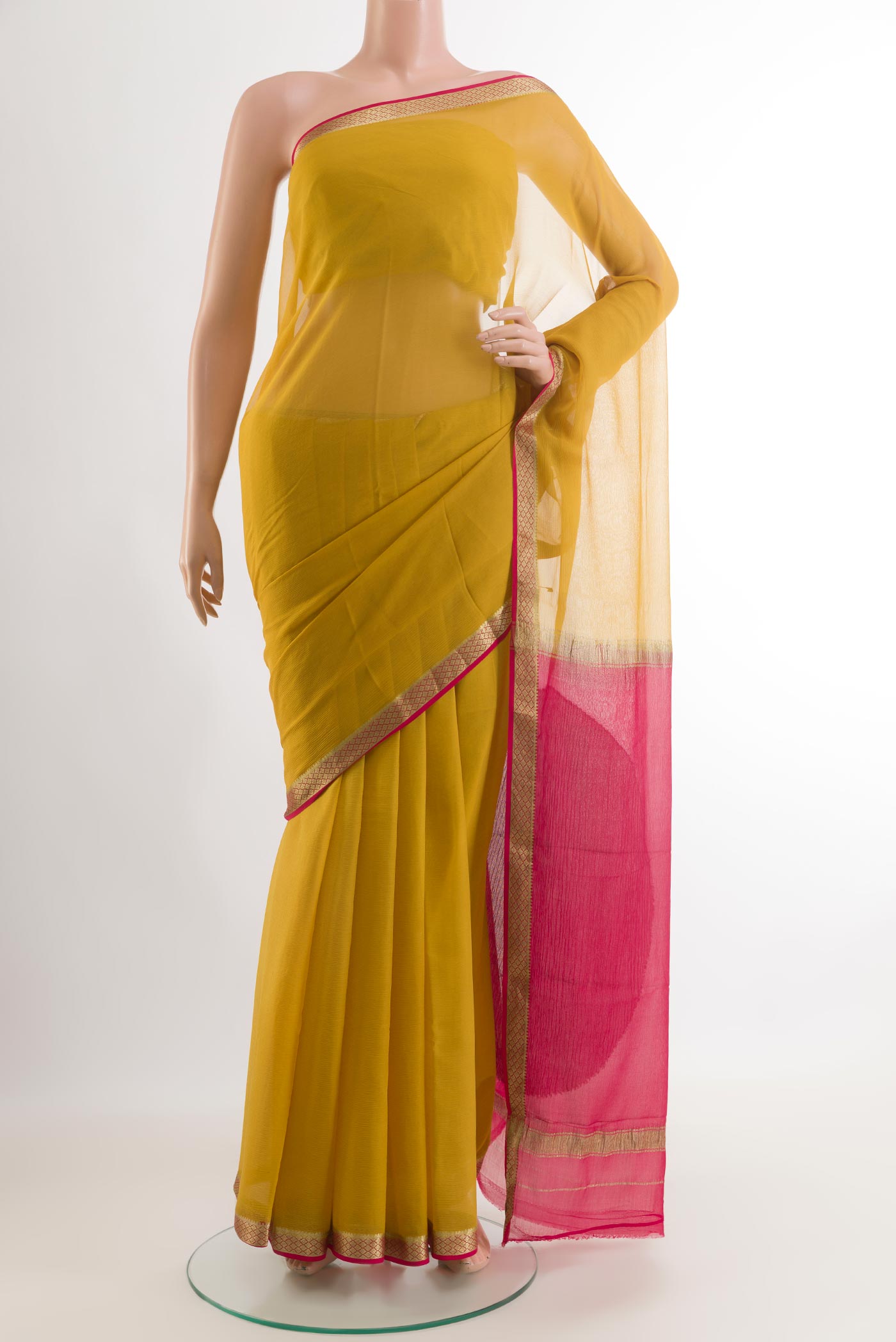 Yellow Mysore Chiffon Saree with Plain Body and Zari Border.  displayed on a mannequin