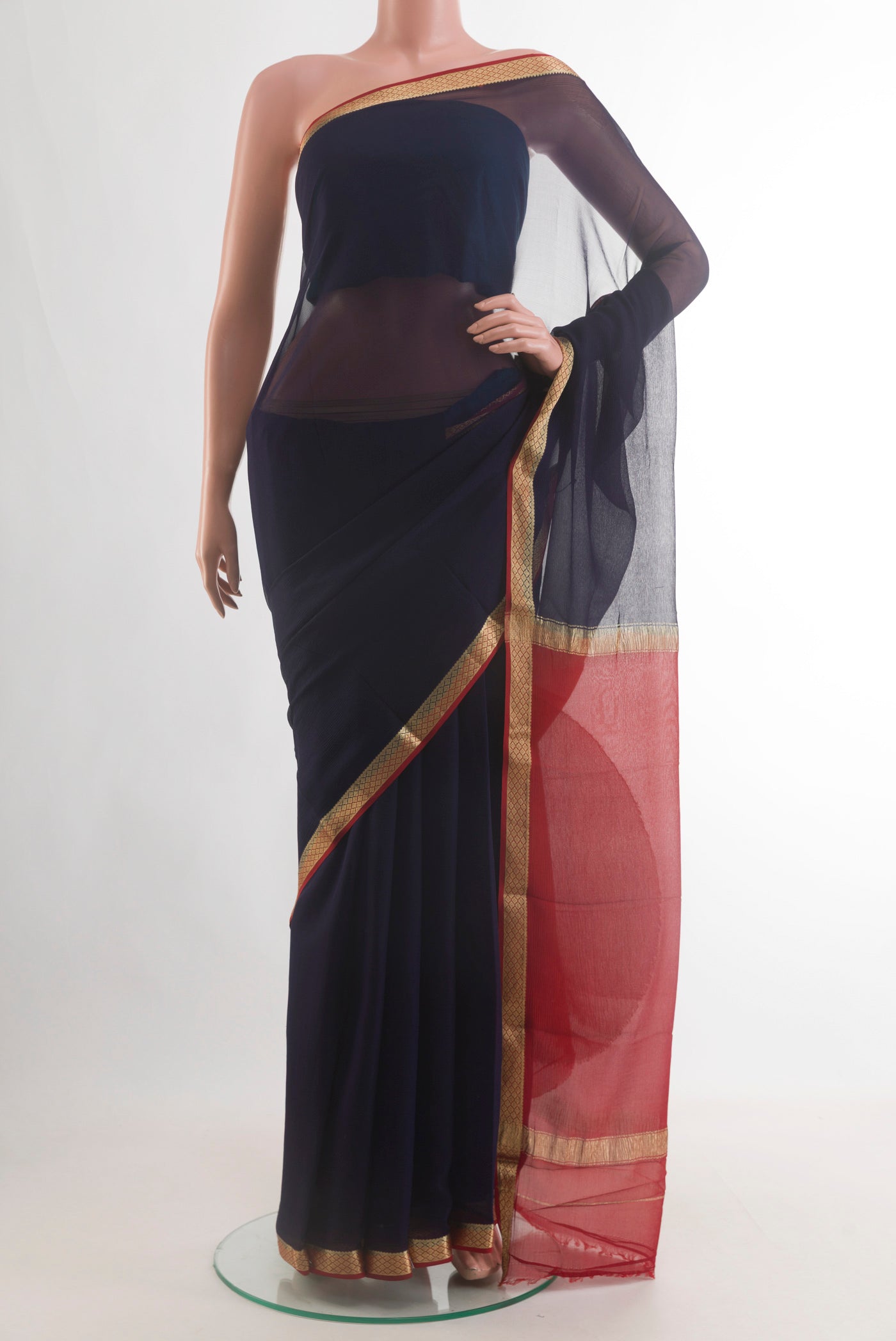 Dark Blue Mysore Chiffon Saree with Plain Body and Zari Border.  displayed on a mannequin