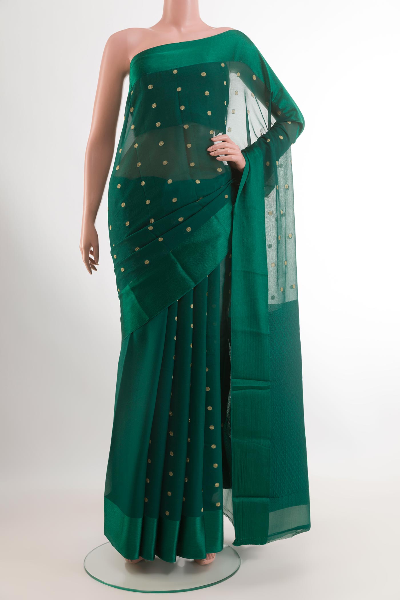 Green Mysore Chiffon Saree with Zari Butta on the body and Plain Border.  displayed on a mannequin