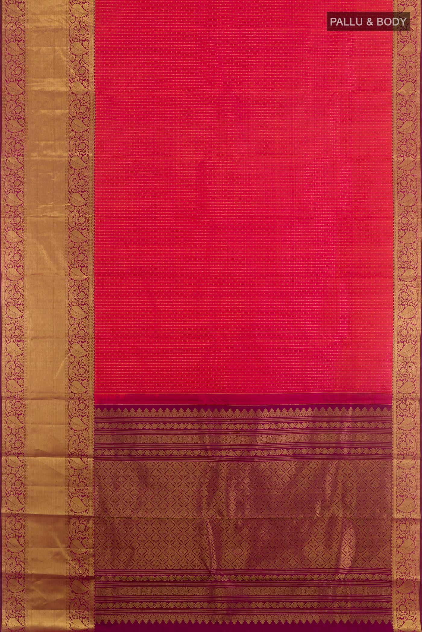 Flat view of Peach Kanchipuram Silk Saree with Zari Butta on the body and Zari Border. 