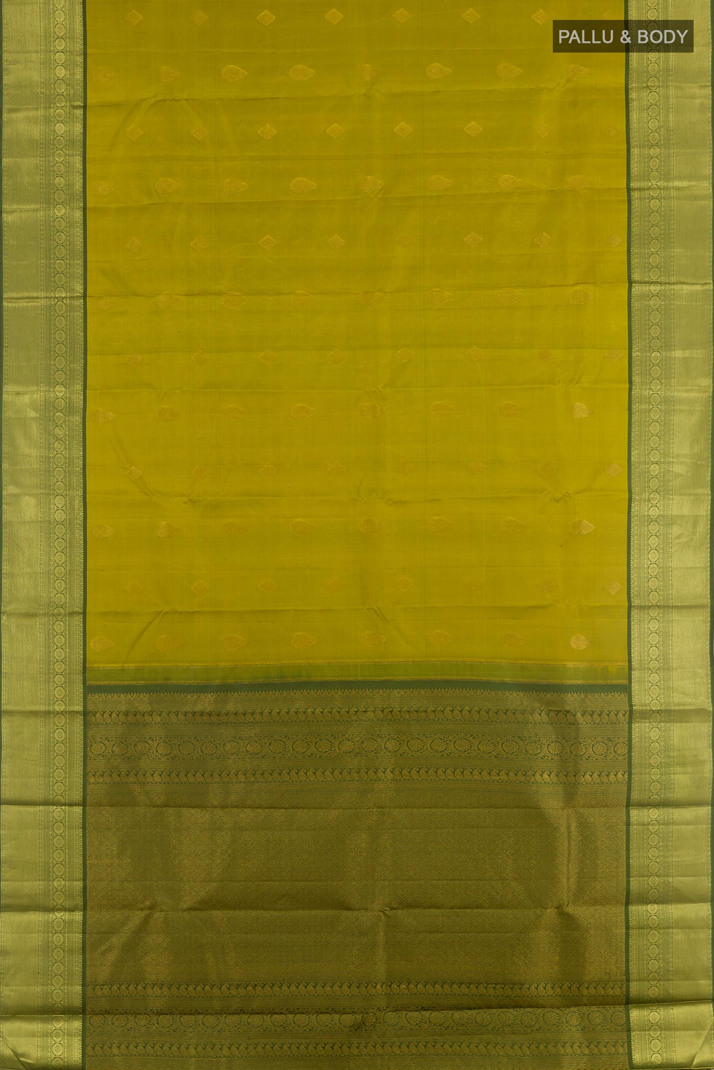 Flat view of Light Green Tussar Silk Saree with Zari Butta on the body and Zari Border. 