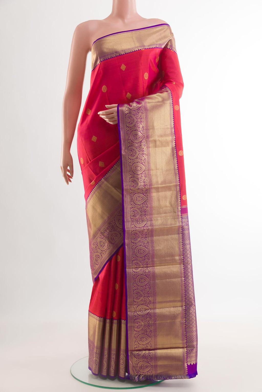 Pink Dual Tone Kanchipuram Silk Saree with Zari Butta on the body and Zari Border.  displayed on a mannequin