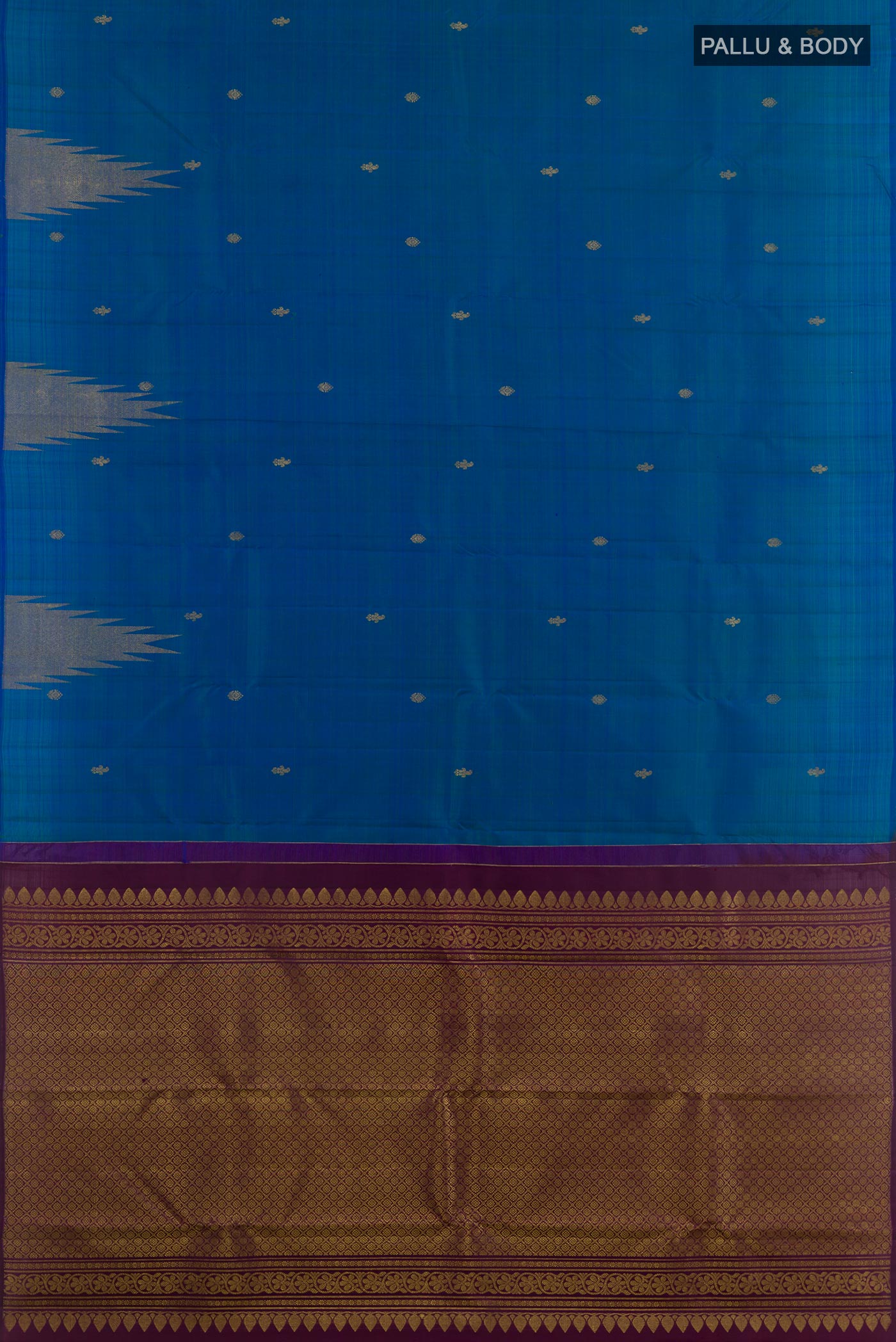 Flat view of Blue Kanchipuram Silk Saree with Zari Butta on the body and Zari Border. 