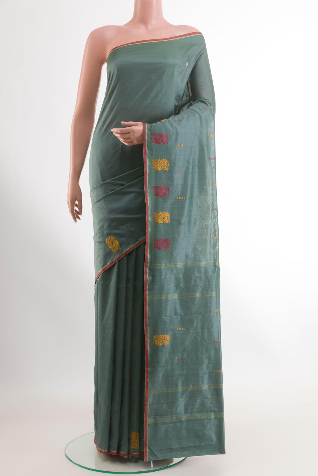 Grey Kanchipuram Silk Saree with Thread Butta on the body and Thread Border.  displayed on a mannequin