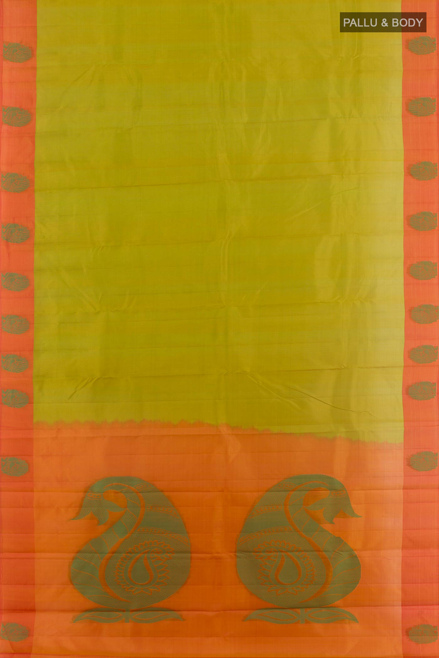 Flat view of Green Kanjivaram Silk Saree with Zari Butta on the body and Thread Border. 