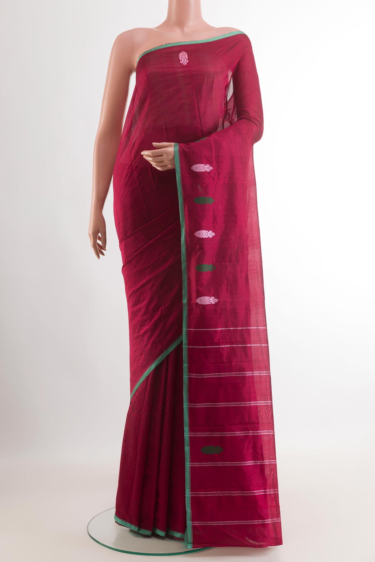 Maroon Kanchipuram Silk Saree with Plain Body and Thread Border.  displayed on a mannequin