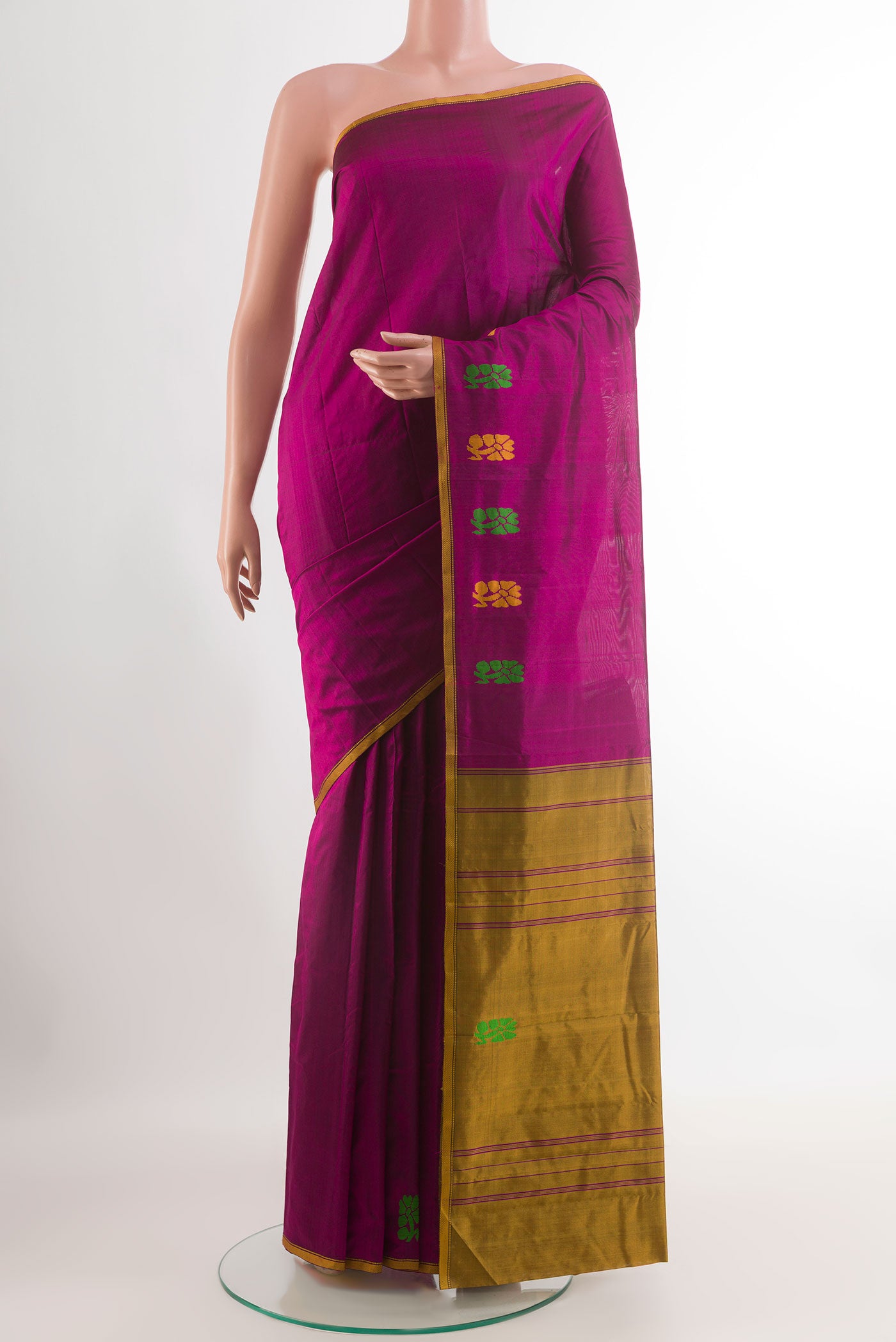 Purple Kanchipuram Silk Saree with Plain Body and Zari Border.  displayed on a mannequin