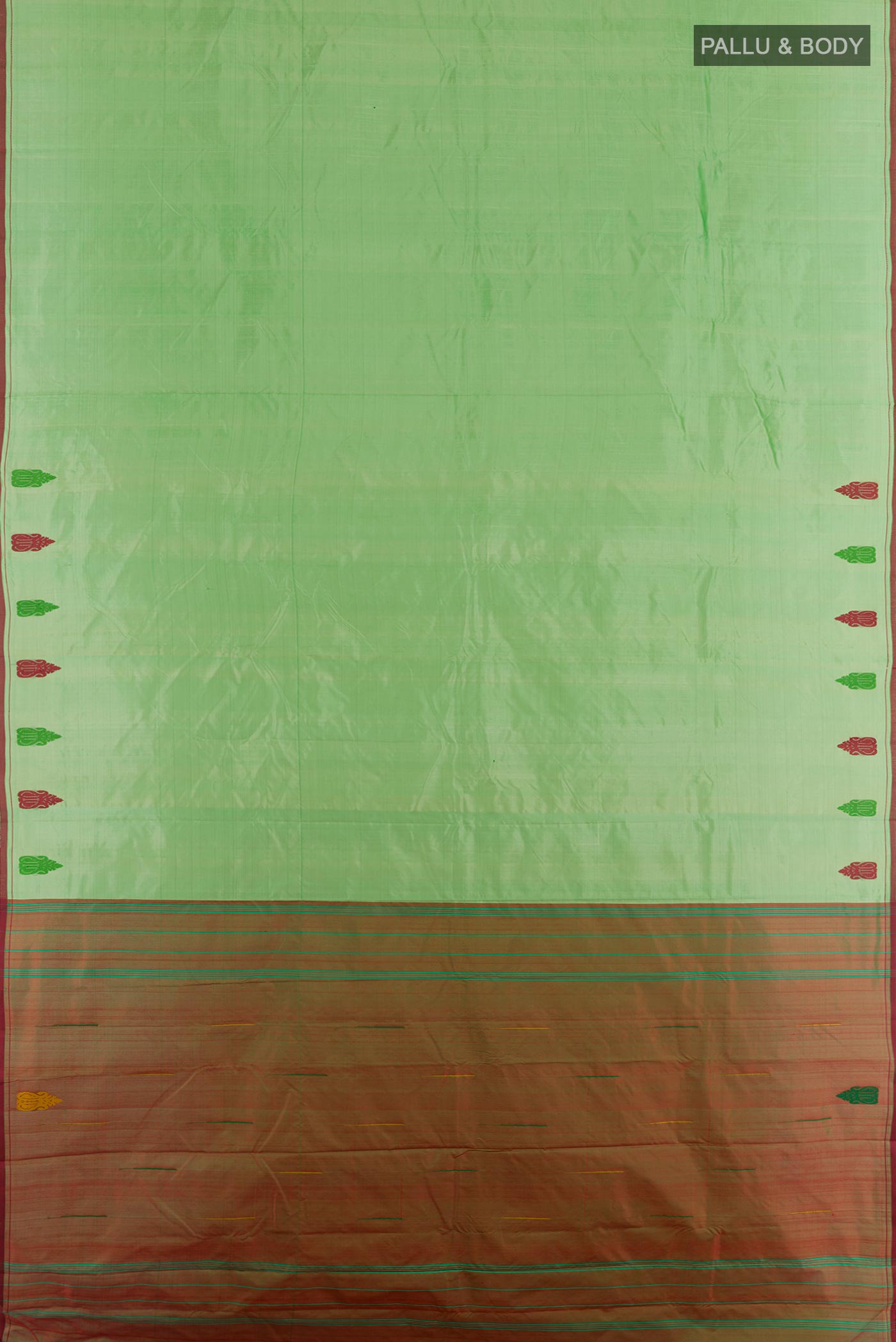 Flat view of Mint Green Kanchipuram Silk Saree with Plain Body and Thread Border. 