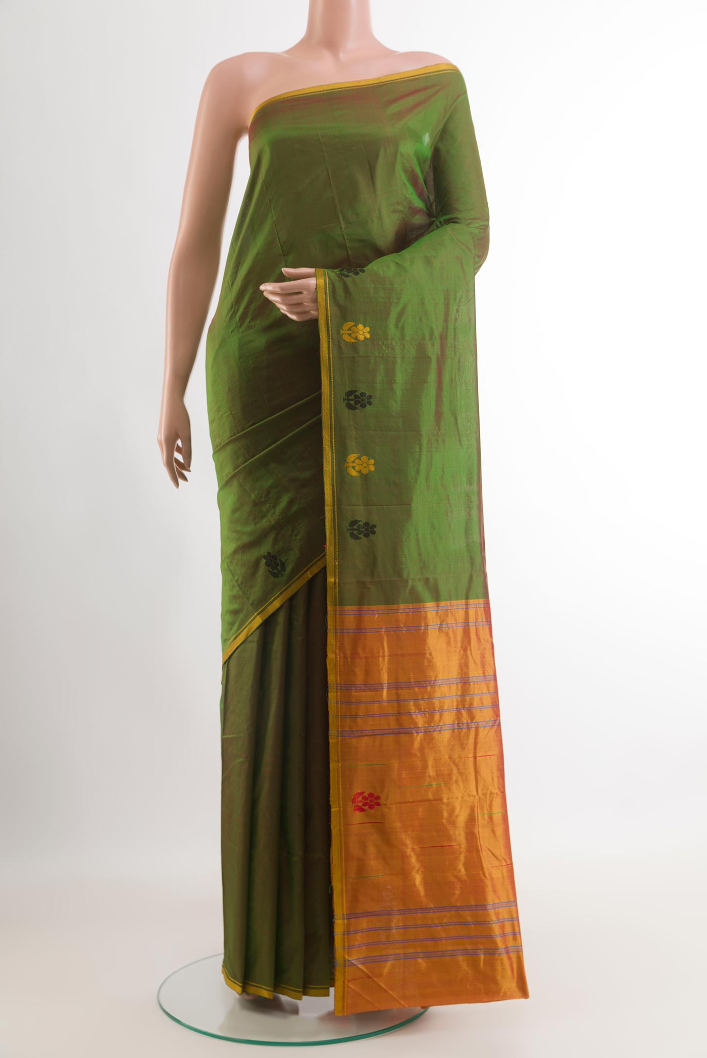Green Kanchipuram Silk Saree with Plain Body and Thread Border.  displayed on a mannequin