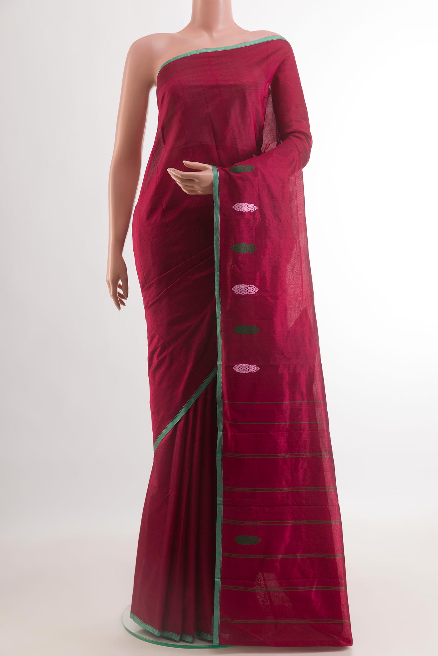 Maroon Kanchipuram Silk Saree with Plain Body and Thread Border.  displayed on a mannequin