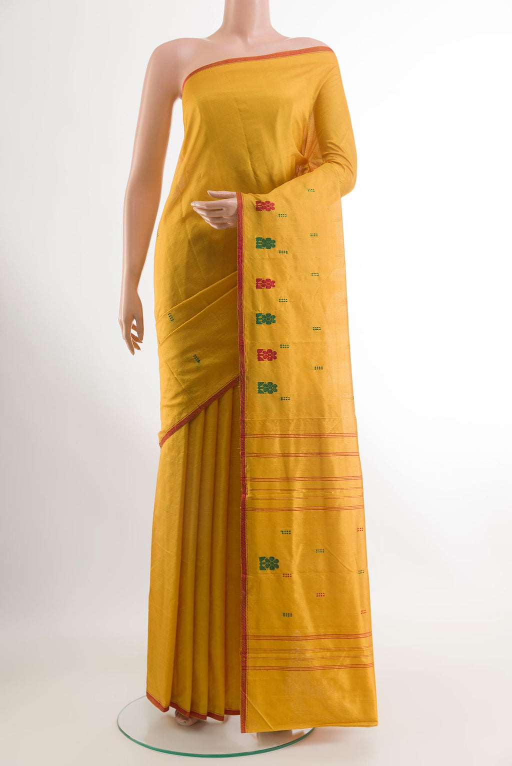 Yellow Kanchipuram Silk Saree with Thread Butta on the body and Thread Border.  displayed on a mannequin