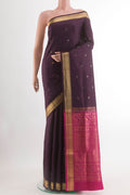 Purple Soft Silk Saree with Zari Butta on the body and Zari Border.  displayed on a mannequin
