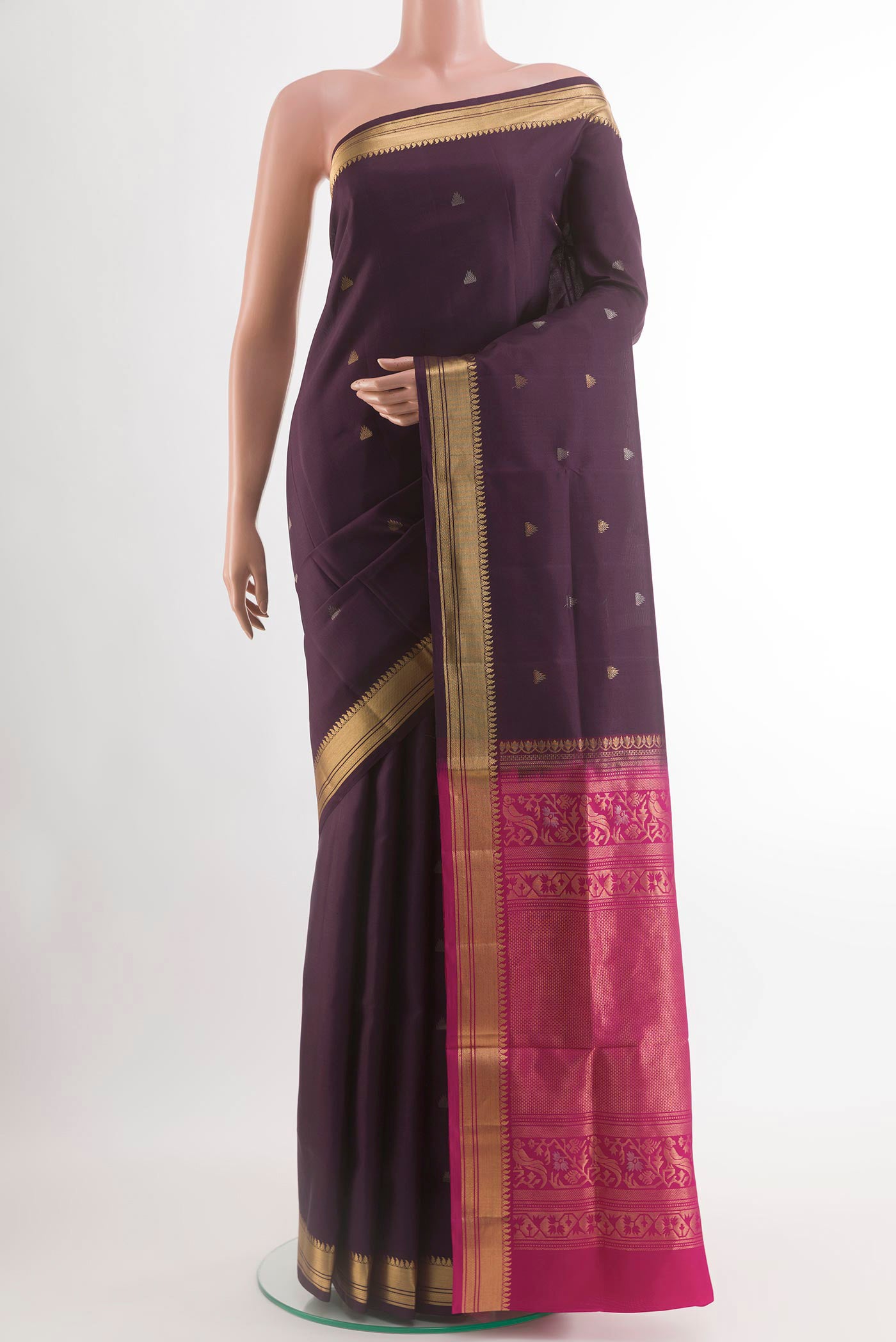 Purple Soft Silk Saree with Zari Butta on the body and Zari Border.  displayed on a mannequin