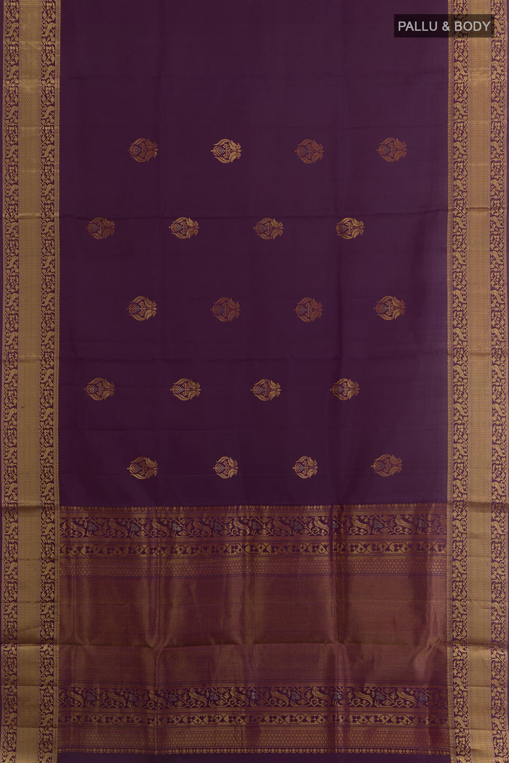 Flat view of Purple Soft Silk Saree with Zari Butta on the body and Zari Border. 