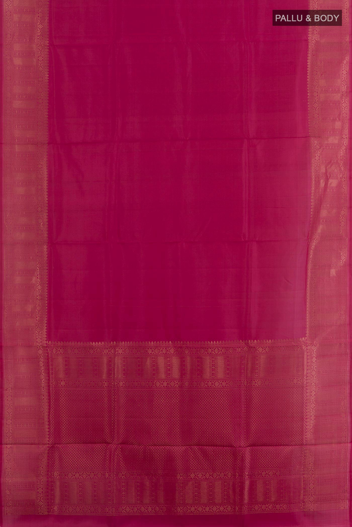 Flat view of Magenta Soft Silk Saree with Zari Butta on the body and Zari Border. 