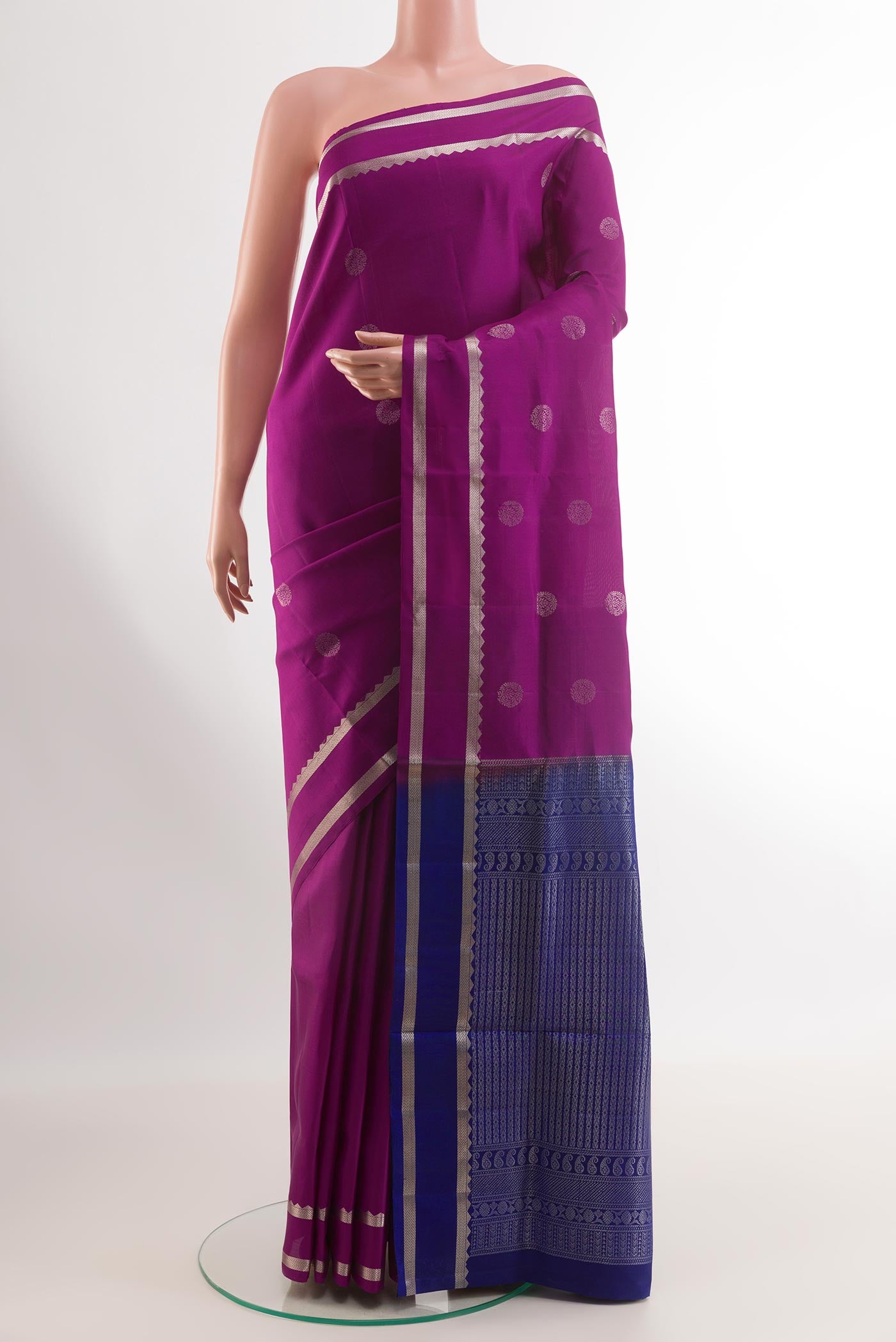 Purple Soft Silk Saree with Zari Butta on the body and Zari Border.  displayed on a mannequin
