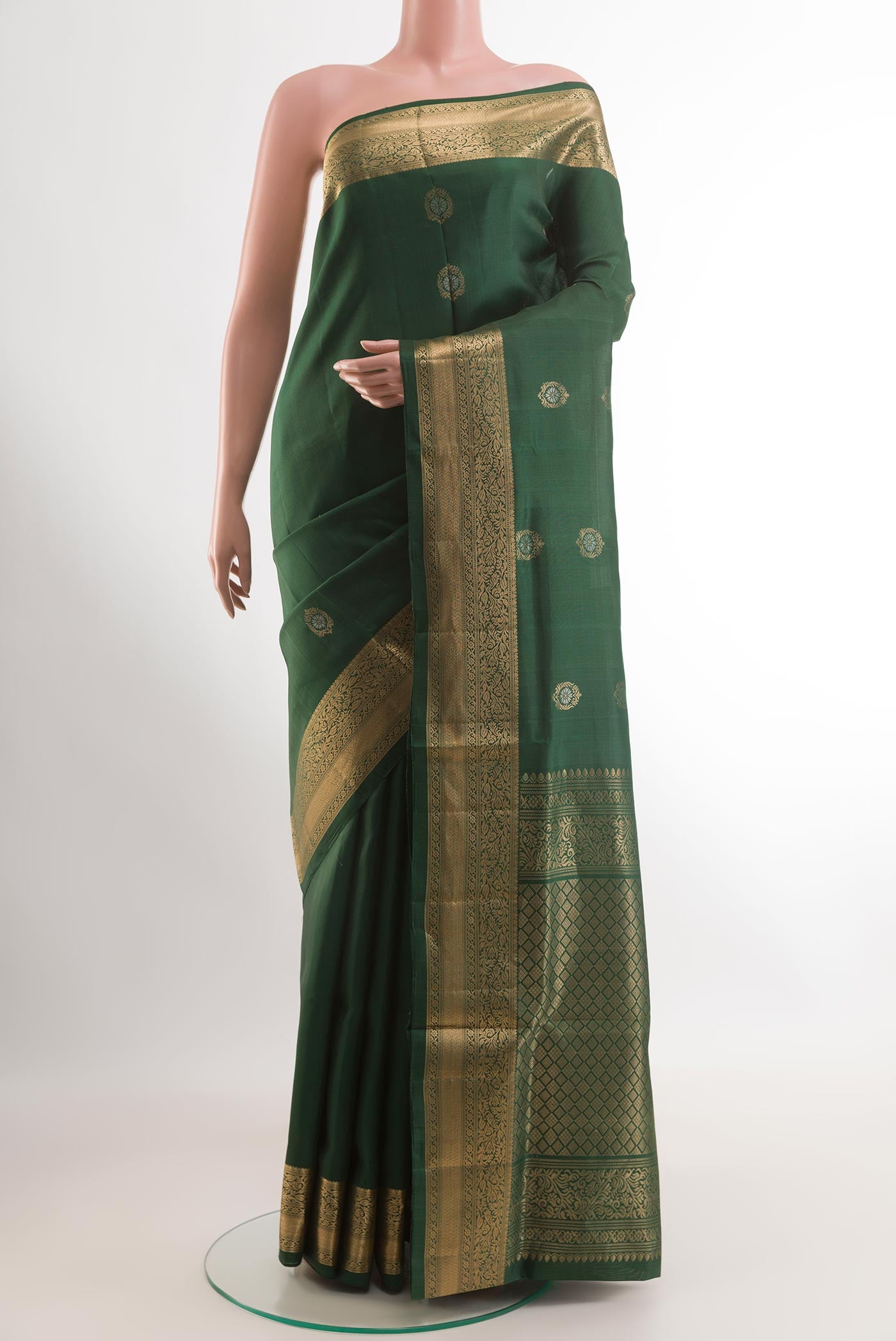 Red Soft Silk Saree with Zari Butta on the body and Zari Border.  displayed on a mannequin