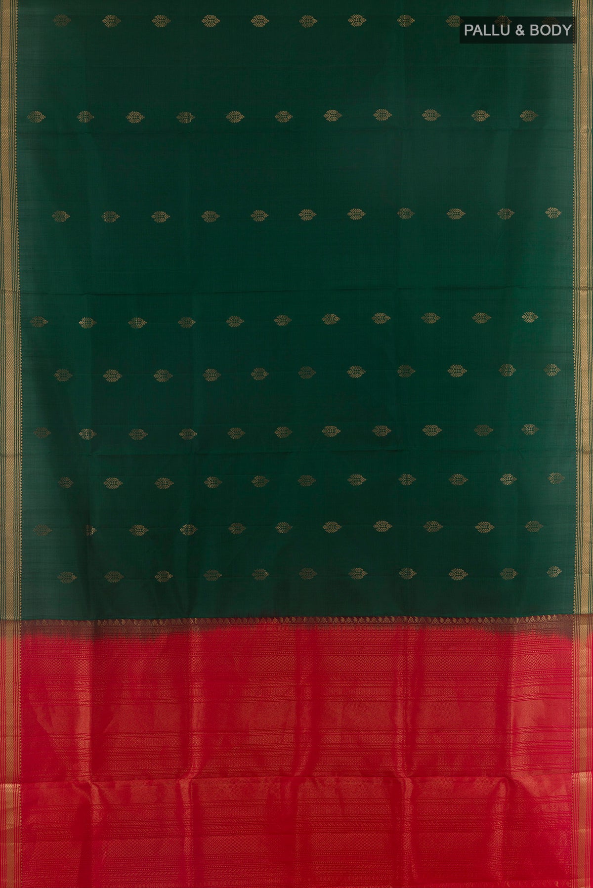 Flat view of Pure Silk Bottle Green Soft Saree with Zari Butta on the body and Zari Border. 