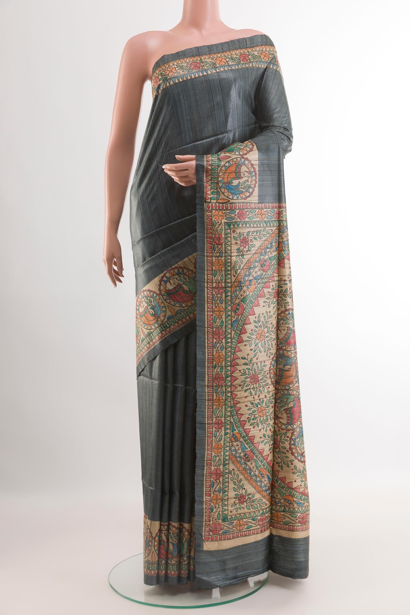 Grey Tussar Saree with Plain Body and Printed Border.  displayed on a mannequin