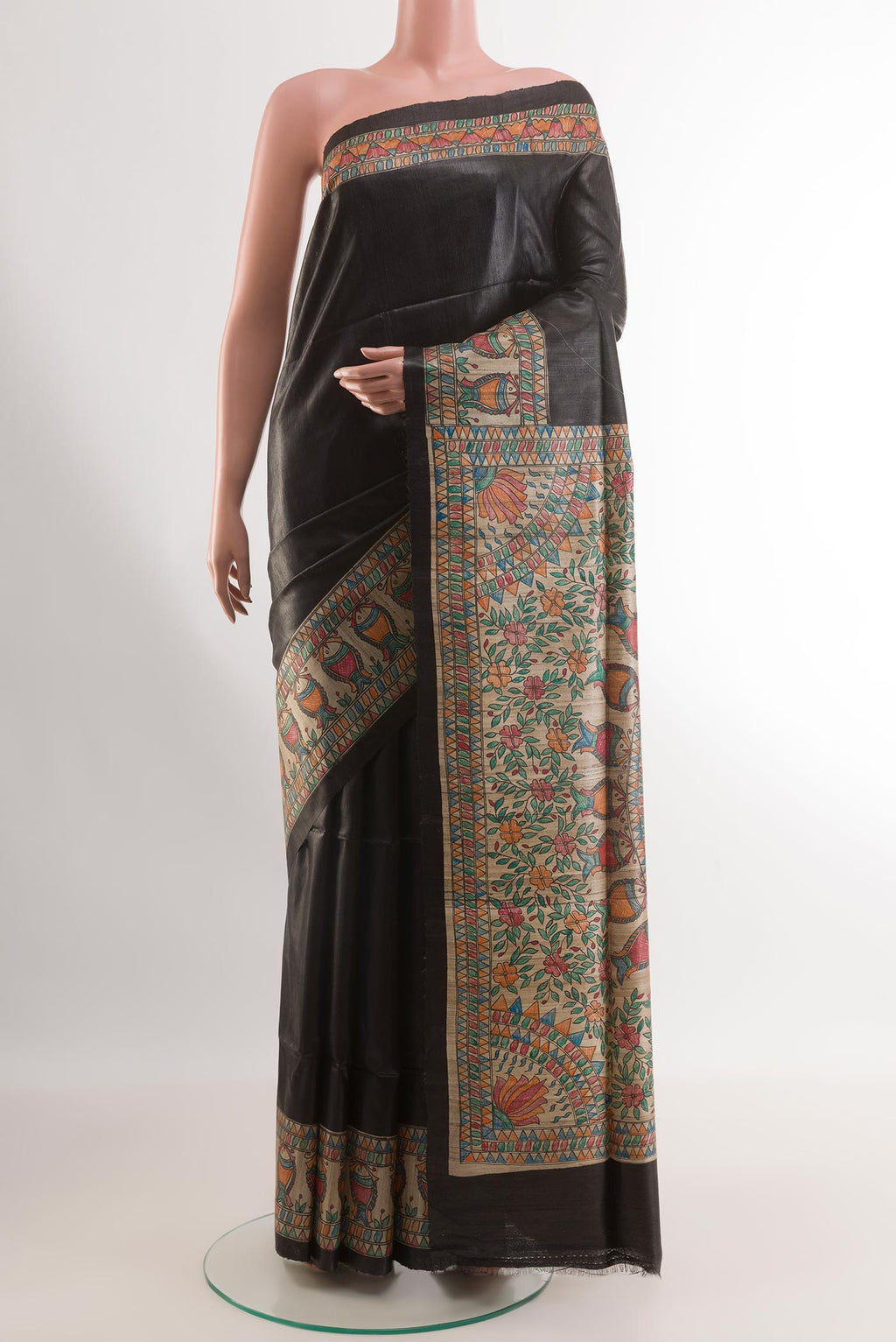 Black Tussar Silk Saree with Plain Body and Printed Border.  displayed on a mannequin