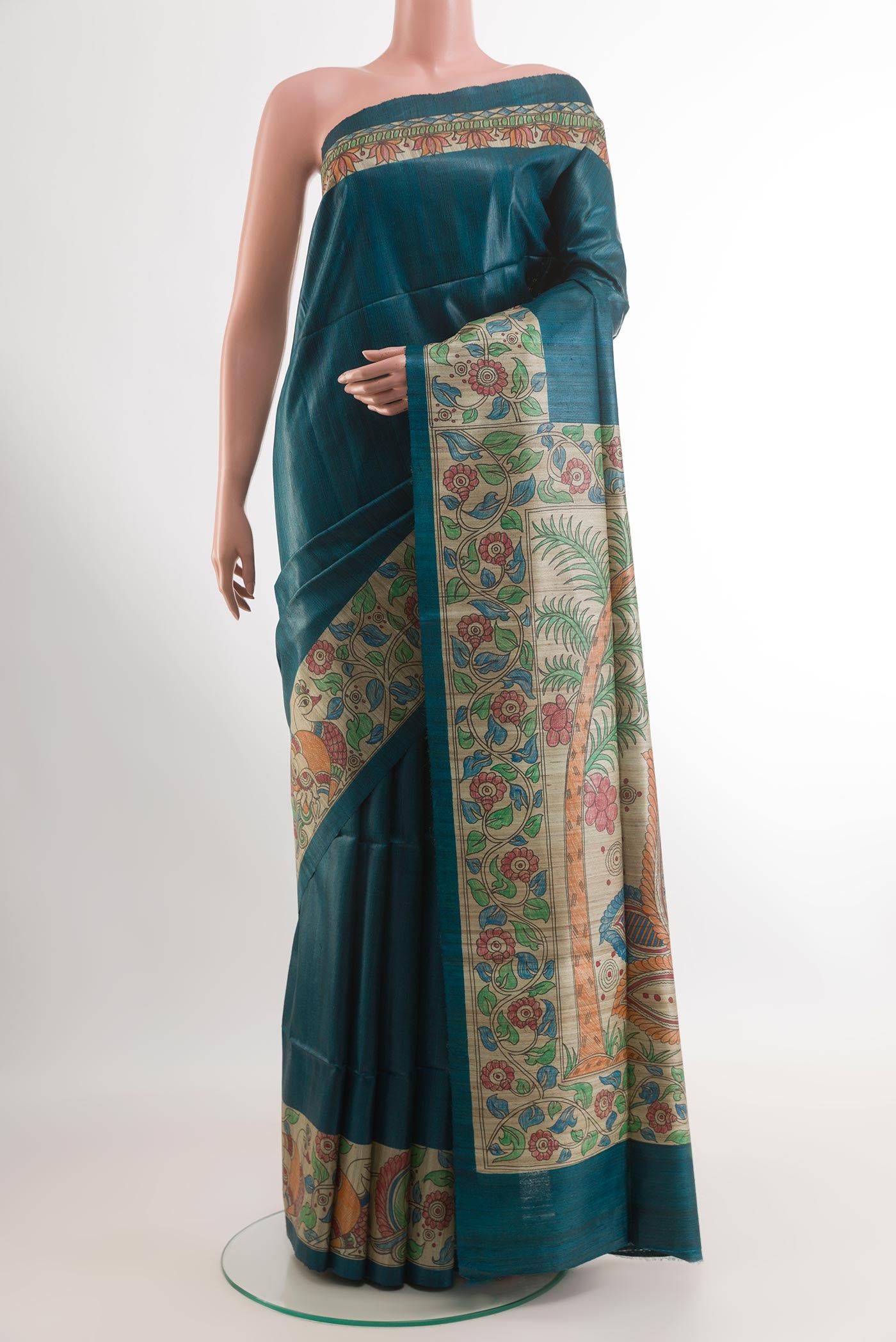 Blue Tussar Saree with Plain Body and Printed Border.  displayed on a mannequin