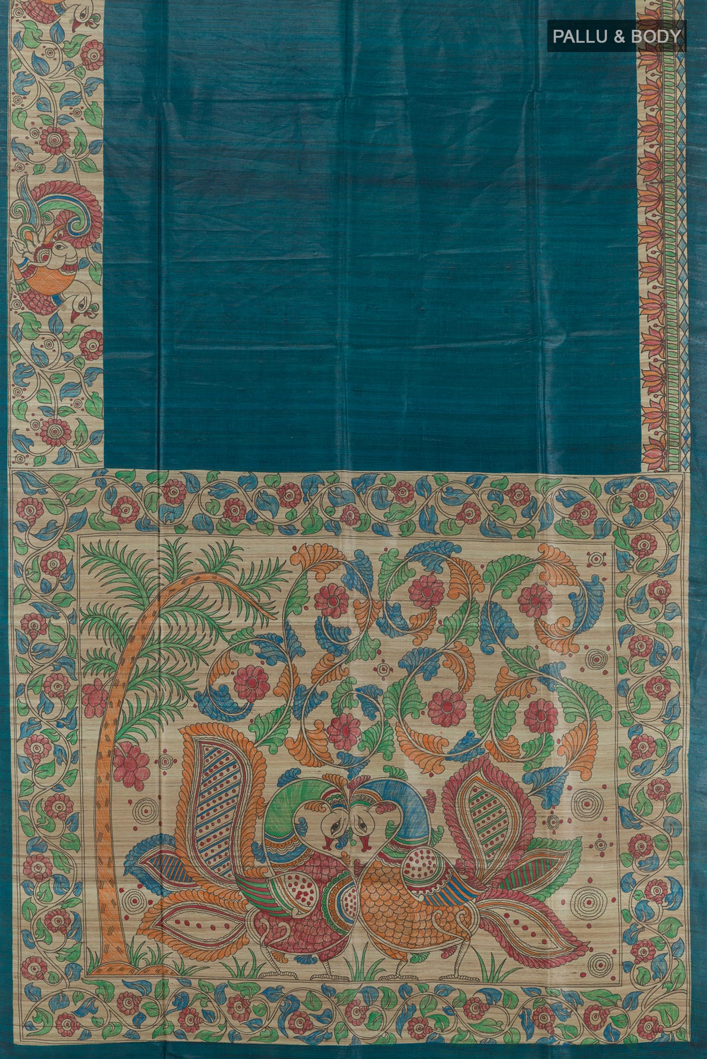 Flat view of Blue Tussar Saree with Plain Body and Printed Border. 