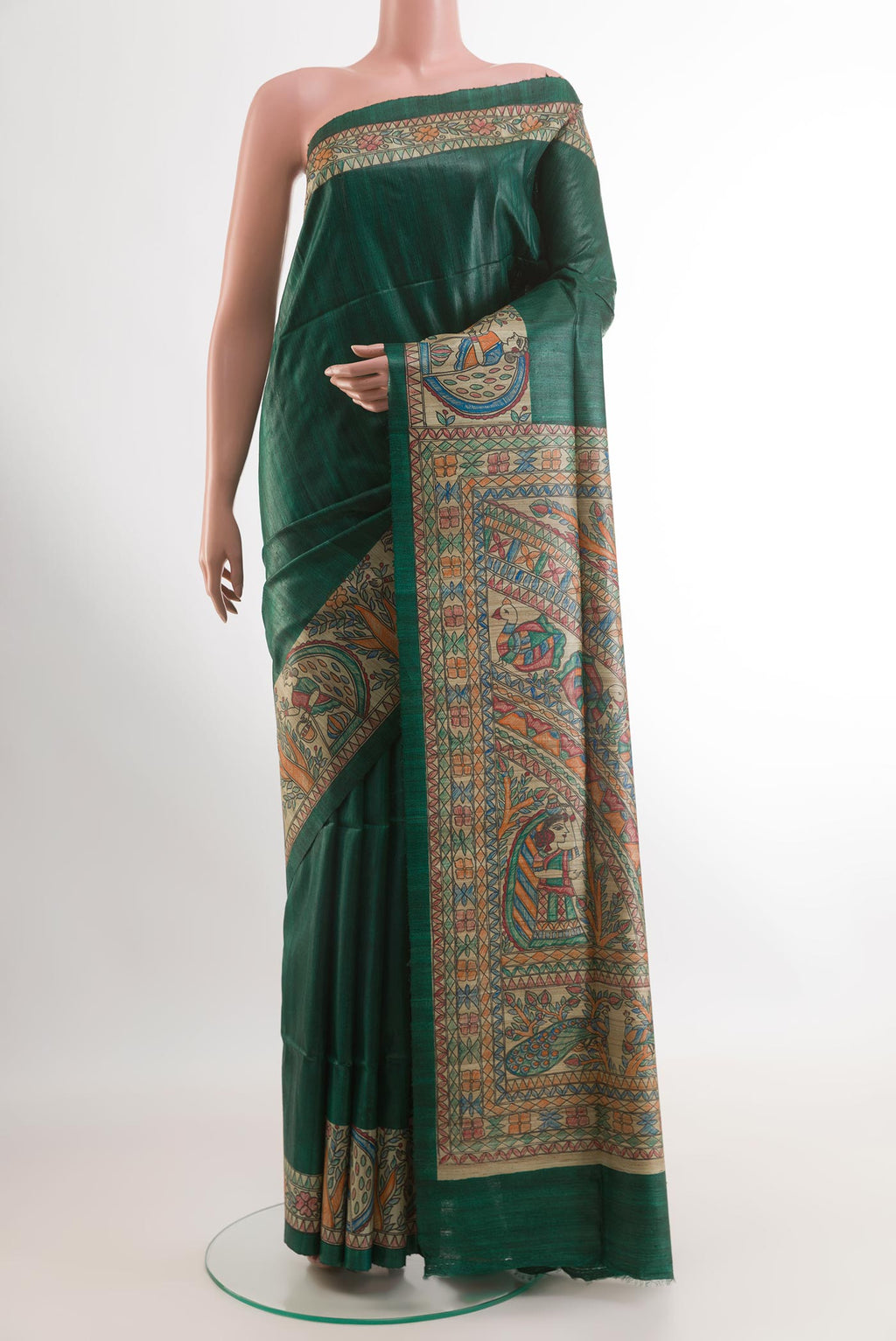 Green Tussar Saree with Plain Body and Printed Border.  displayed on a mannequin