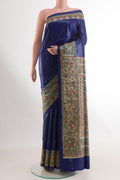 Blue Tussar Saree with Plain Body and Printed Border.  displayed on a mannequin
