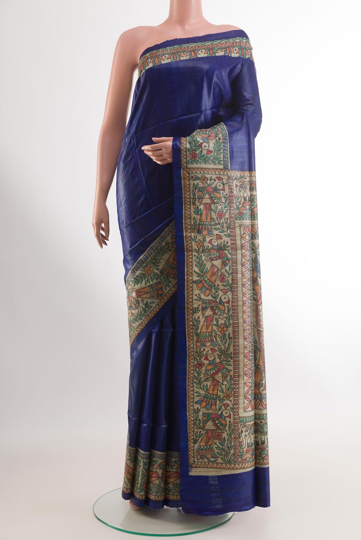 Blue Tussar Saree with Plain Body and Printed Border.  displayed on a mannequin