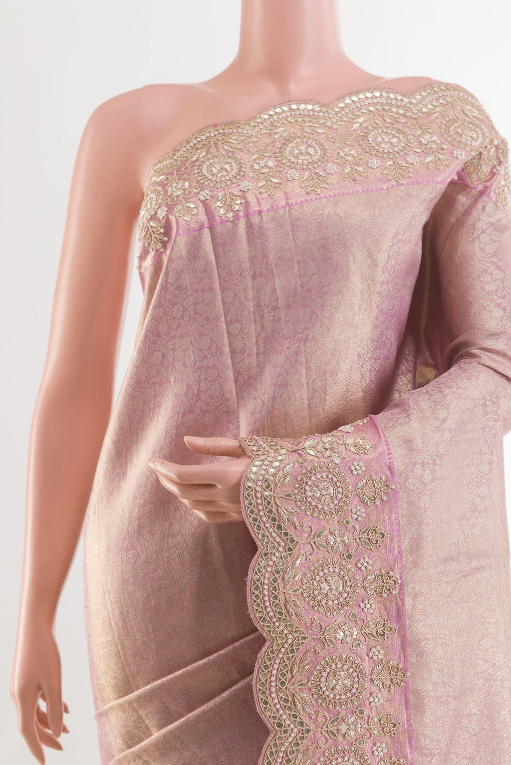 Border image of Rose Gold Kanjivaram Tissue Silk Saree with Zari Brocade on the body and Embroidery Border. 