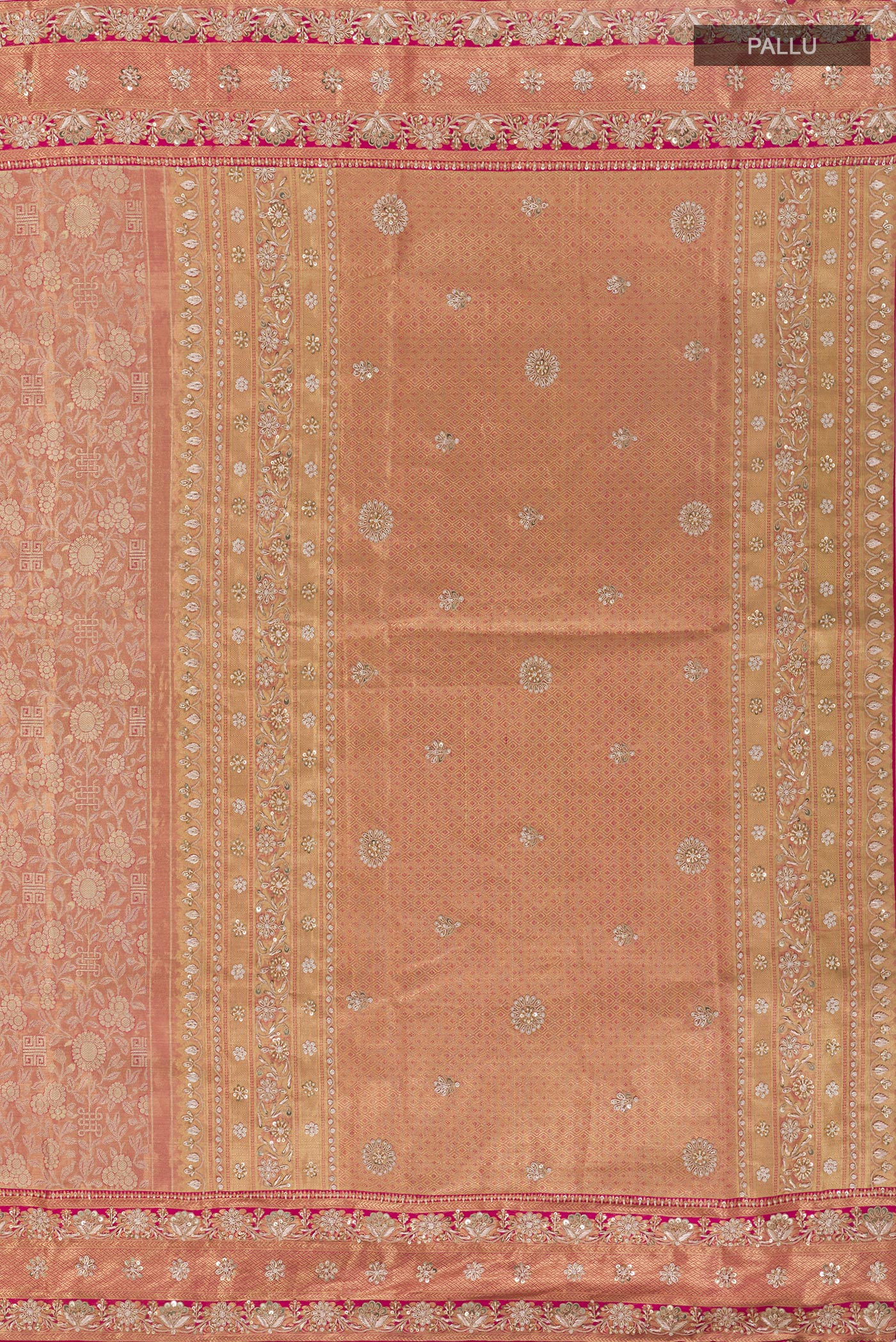Close up image of the pallu of Pink Kanjivaram Tissue Silk Saree with Zari Brocade on the body and Embroidery Border. 