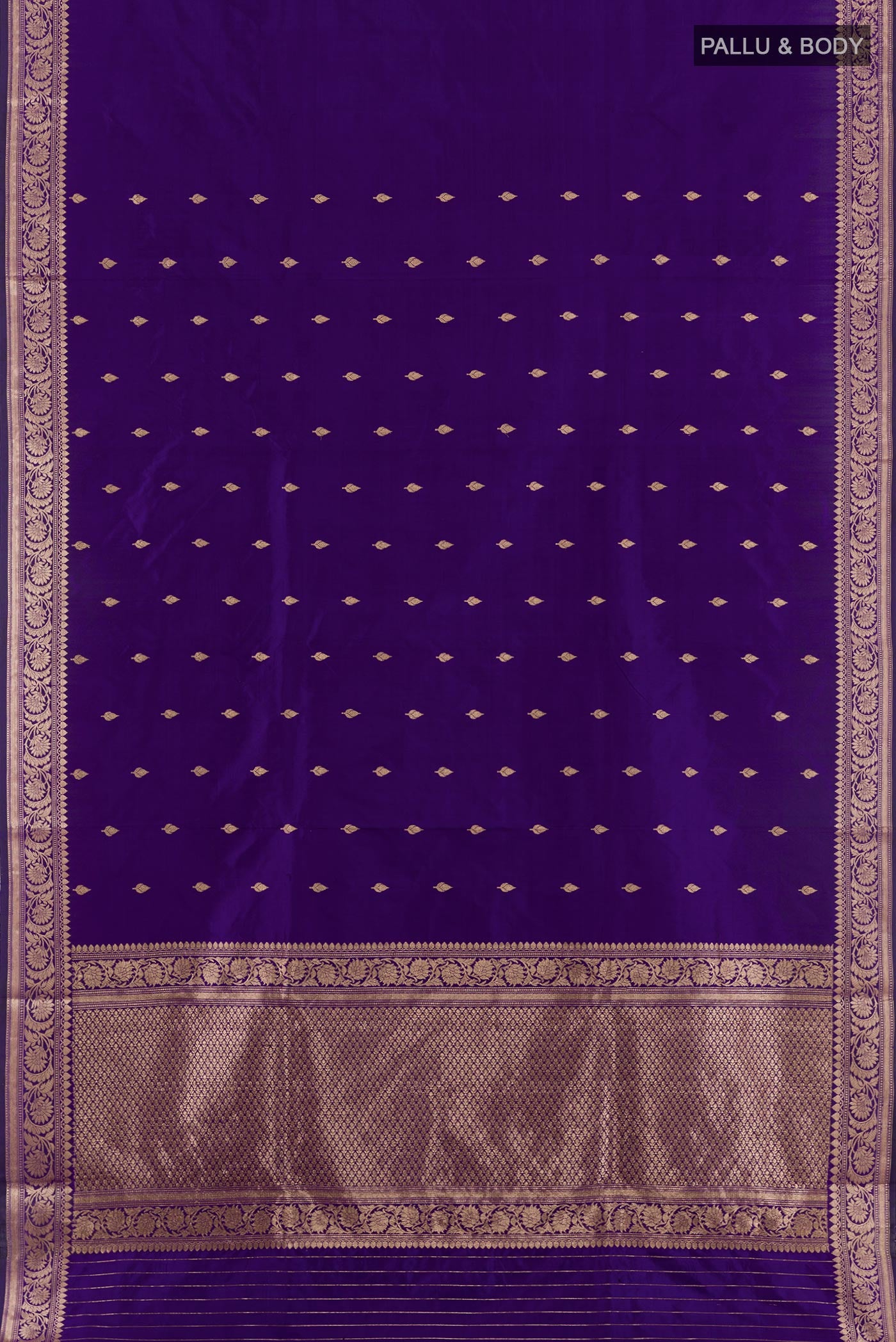 Flat view of Purple Banarasi Katan Silk Saree with Zari Butta on the body and Zari Border. 