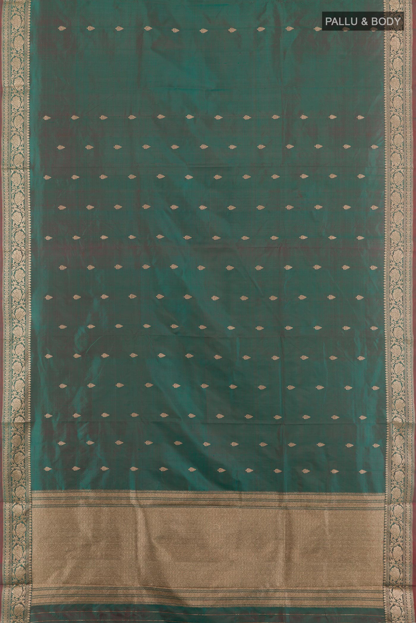 Flat view of Green Banarasi Katan Silk Saree with Zari Butta on the body and Zari Border. 