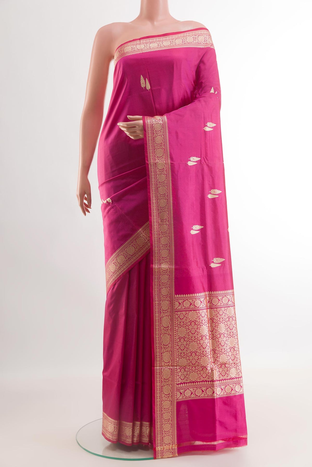 Pink Banarasi Katan Silk Saree with Zari Butta on the body and Zari Border.  displayed on a mannequin
