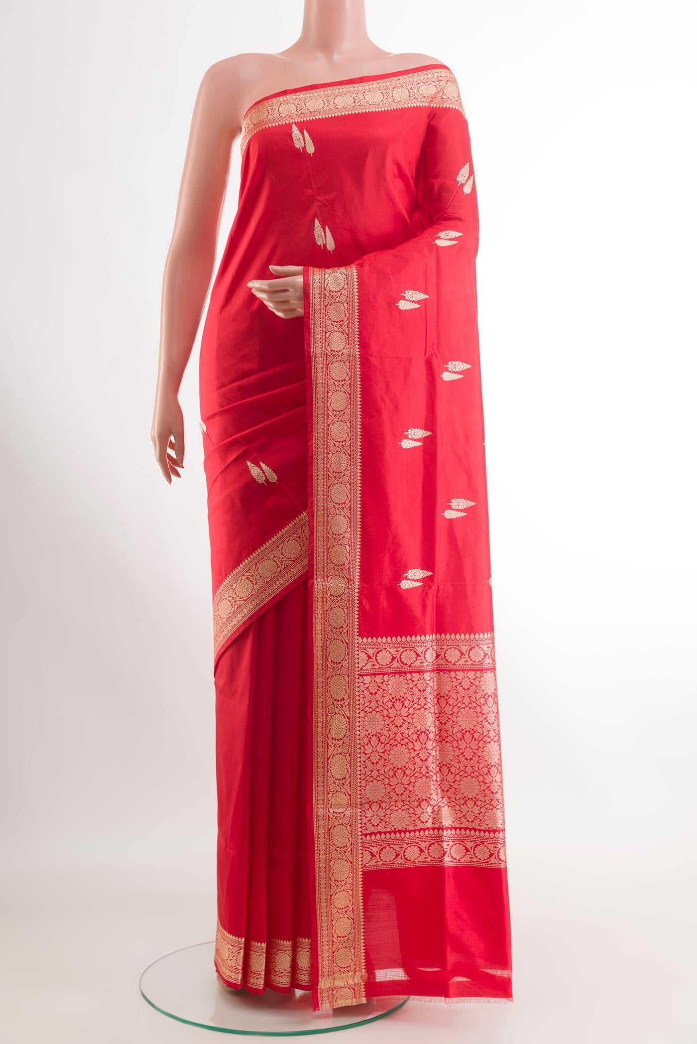 Red Banarasi Katan Silk Saree with Zari Butta on the body and Zari Border.  displayed on a mannequin